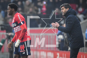 2023-03-10 - Jonathan DAVID of Lille and Paulo FONSECA of Lille during the French championship Ligue 1 football match between LOSC Lille and Olympique Lyonnais (Lyon) on March 10, 2023 at Pierre Mauroy stadium in Villeneuve-d'Ascq near Lille, France - FOOTBALL - FRENCH CHAMP - LILLE V LYON - FRENCH LIGUE 1 - SOCCER