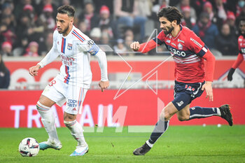 2023-03-10 - Corentin TOLISSO of Lyon and Andre GOMES of Lille during the French championship Ligue 1 football match between LOSC Lille and Olympique Lyonnais (Lyon) on March 10, 2023 at Pierre Mauroy stadium in Villeneuve-d'Ascq near Lille, France - FOOTBALL - FRENCH CHAMP - LILLE V LYON - FRENCH LIGUE 1 - SOCCER