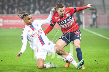 2023-03-10 - Bradley BARCOLA of Lyon and Gabriel GUDMUNDSSON of Lille during the French championship Ligue 1 football match between LOSC Lille and Olympique Lyonnais (Lyon) on March 10, 2023 at Pierre Mauroy stadium in Villeneuve-d'Ascq near Lille, France - FOOTBALL - FRENCH CHAMP - LILLE V LYON - FRENCH LIGUE 1 - SOCCER