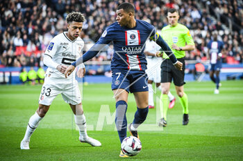 2023-03-19 - Desire DOUE of Rennes and Kylian MBAPPE of PSG during the French championship Ligue 1 football match between Paris Saint-Germain and Stade Rennais (Rennes) on March 19, 2023 at Parc des Princes stadium in Paris, France - FOOTBALL - FRENCH CHAMP - PARIS SG V RENNES - FRENCH LIGUE 1 - SOCCER