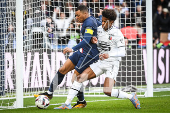 2023-03-19 - Kylian MBAPPE of PSG and Warmed OMARI of Rennes during the French championship Ligue 1 football match between Paris Saint-Germain and Stade Rennais (Rennes) on March 19, 2023 at Parc des Princes stadium in Paris, France - FOOTBALL - FRENCH CHAMP - PARIS SG V RENNES - FRENCH LIGUE 1 - SOCCER