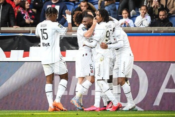 2023-03-19 - Karl TOKO-EKAMBI of Rennes celebrate his goal with teammates during the French championship Ligue 1 football match between Paris Saint-Germain and Stade Rennais (Rennes) on March 19, 2023 at Parc des Princes stadium in Paris, France - FOOTBALL - FRENCH CHAMP - PARIS SG V RENNES - FRENCH LIGUE 1 - SOCCER