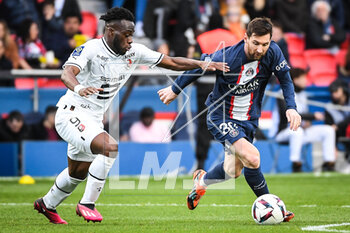 2023-03-19 - Arnaud KALIMUENDO of Rennes and Lionel (Leo) MESSI of PSG during the French championship Ligue 1 football match between Paris Saint-Germain and Stade Rennais (Rennes) on March 19, 2023 at Parc des Princes stadium in Paris, France - FOOTBALL - FRENCH CHAMP - PARIS SG V RENNES - FRENCH LIGUE 1 - SOCCER