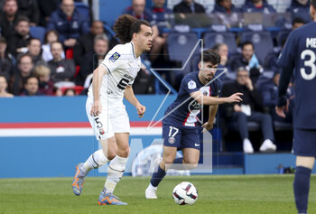 2023-03-19 - Arthur Theate of Rennes, Vitinha of PSG during the French championship Ligue 1 football match between Paris Saint-Germain and Stade Rennais (Rennes) on March 19, 2023 at Parc des Princes stadium in Paris, France - FOOTBALL - FRENCH CHAMP - PARIS SG V RENNES - FRENCH LIGUE 1 - SOCCER