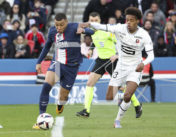 2023-03-19 - Kylian Mbappe of PSG, Warmed Omari of Rennes during the French championship Ligue 1 football match between Paris Saint-Germain and Stade Rennais (Rennes) on March 19, 2023 at Parc des Princes stadium in Paris, France - FOOTBALL - FRENCH CHAMP - PARIS SG V RENNES - FRENCH LIGUE 1 - SOCCER