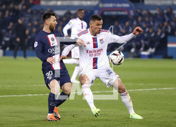 2023-04-02 - Lionel Messi of PSG, Dejan Lovren of Lyon during the French championship Ligue 1 football match between Paris Saint-Germain and Olympique Lyonnais (Lyon) on April 2, 2023 at Parc des Princes stadium in Paris, France - FOOTBALL - FRENCH CHAMP - PARIS SG V LYON - FRENCH LIGUE 1 - SOCCER