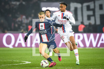 2023-04-02 - Ismael GHARBI of PSG and Bradley BARCOLA of Lyon during the French championship Ligue 1 football match between Paris Saint-Germain and Olympique Lyonnais (Lyon) on April 2, 2023 at Parc des Princes stadium in Paris, France - FOOTBALL - FRENCH CHAMP - PARIS SG V LYON - FRENCH LIGUE 1 - SOCCER