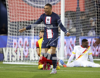 2023-04-15 - Kylian Mbappe of PSG celebrates the goal of Lionel Messi of PSG during the French championship Ligue 1 football match between Paris Saint-Germain and RC Lens on April 15, 2023 at Parc des Princes stadium in Paris, France - FOOTBALL - FRENCH CHAMP - PARIS SG V LENS - FRENCH LIGUE 1 - SOCCER