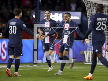 2023-04-15 - Kylian Mbappe, Carlos Soler (center) of PSG celebrate the goal of Lionel Messi (left) during the French championship Ligue 1 football match between Paris Saint-Germain and RC Lens on April 15, 2023 at Parc des Princes stadium in Paris, France - FOOTBALL - FRENCH CHAMP - PARIS SG V LENS - FRENCH LIGUE 1 - SOCCER