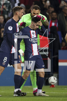 2023-04-15 - Vitinha of PSG celebrates his goal with PSG goalkeeper Gianluigi Donnarumma during the French championship Ligue 1 football match between Paris Saint-Germain and RC Lens on April 15, 2023 at Parc des Princes stadium in Paris, France - FOOTBALL - FRENCH CHAMP - PARIS SG V LENS - FRENCH LIGUE 1 - SOCCER