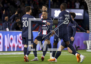 2023-04-15 - Lionel Messi of PSG celebrates his goal with Kylian Mbappe and teammates during the French championship Ligue 1 football match between Paris Saint-Germain (PSG) and RC Lens on April 15, 2023 at Parc des Princes stadium in Paris, France - FOOTBALL - FRENCH CHAMP - PARIS SG V LENS - FRENCH LIGUE 1 - SOCCER