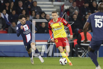 2023-04-15 - Przemyslaw Frankowski of Lens, Vitinha of PSG (left) during the French championship Ligue 1 football match between Paris Saint-Germain (PSG) and RC Lens on April 15, 2023 at Parc des Princes stadium in Paris, France - FOOTBALL - FRENCH CHAMP - PARIS SG V LENS - FRENCH LIGUE 1 - SOCCER