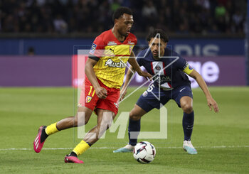 2023-04-15 - Lois Openda of Lens, Marquinhos of PSG during the French championship Ligue 1 football match between Paris Saint-Germain (PSG) and RC Lens on April 15, 2023 at Parc des Princes stadium in Paris, France - FOOTBALL - FRENCH CHAMP - PARIS SG V LENS - FRENCH LIGUE 1 - SOCCER