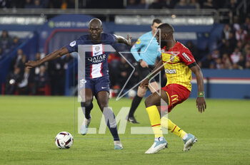 2023-04-15 - Danilo Pereira of PSG, Jean Onana of Lens during the French championship Ligue 1 football match between Paris Saint-Germain (PSG) and RC Lens on April 15, 2023 at Parc des Princes stadium in Paris, France - FOOTBALL - FRENCH CHAMP - PARIS SG V LENS - FRENCH LIGUE 1 - SOCCER