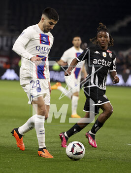 2023-04-21 - Carlos Soler of PSG, Justin-Noel Kalumba Mwana-Ngongo of Angers during the French championship Ligue 1 football match between SCO Angers and Paris Saint-Germain (PSG) on April 21, 2023 at Stade Raymond Kopa in Angers, France - FOOTBALL - FRENCH CHAMP - ANGERS V PARIS SG - FRENCH LIGUE 1 - SOCCER