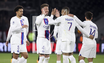 2023-04-21 - Kylian Mbappe of PSG celebrates his second goal with Sergio Ramos, Marquinhos during the French championship Ligue 1 football match between SCO Angers and Paris Saint-Germain (PSG) on April 21, 2023 at Stade Raymond Kopa in Angers, France - FOOTBALL - FRENCH CHAMP - ANGERS V PARIS SG - FRENCH LIGUE 1 - SOCCER