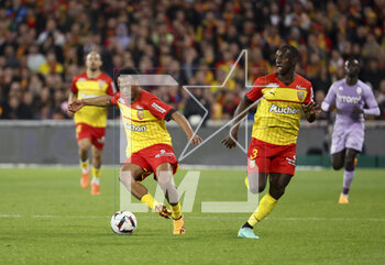 2023-04-22 - Lois Openda, Deiver Machado of Lens during the French championship Ligue 1 football match between RC Lens and AS Monaco on April 22, 2023 at Bollaert-Delelis stadium in Lens, France - FOOTBALL - FRENCH CHAMP - LENS V MONACO - FRENCH LIGUE 1 - SOCCER