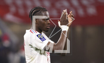 2023-04-23 - Castello Lukeba of Lyon salutes the supporters following the French championship Ligue 1 football match between Olympique Lyonnais (Lyon) and Olympique de Marseille on April 23, 2023 at Groupama stadium in Decines-Charpieu near Lyon, France - FOOTBALL - FRENCH CHAMP - LYON V MARSEILLE - FRENCH LIGUE 1 - SOCCER
