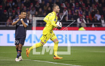 2023-04-23 - Lyon goalkeeper Anthony Lopes, left Alexis Sanchez of Marseille during the French championship Ligue 1 football match between Olympique Lyonnais (Lyon) and Olympique de Marseille on April 23, 2023 at Groupama stadium in Decines-Charpieu near Lyon, France - FOOTBALL - FRENCH CHAMP - LYON V MARSEILLE - FRENCH LIGUE 1 - SOCCER