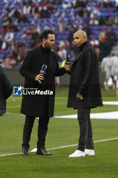 2023-04-23 - Thierry HENRY of Amazon Prime and Thibault LE ROL of Amazon Prime during the French championship Ligue 1 football match between Olympique Lyonnais (Lyon) and Olympique de Marseille on April 23, 2023 at Groupama stadium in Decines-Charpieu near Lyon, France - FOOTBALL - FRENCH CHAMP - LYON V MARSEILLE - FRENCH LIGUE 1 - SOCCER