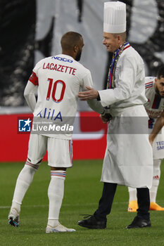 2023-04-23 - Gilles REINHARDT Chef Exécutif of Paul BOCUSE restaurant and Alexandre LACAZETTE of Lyon during the French championship Ligue 1 football match between Olympique Lyonnais (Lyon) and Olympique de Marseille on April 23, 2023 at Groupama stadium in Decines-Charpieu near Lyon, France - FOOTBALL - FRENCH CHAMP - LYON V MARSEILLE - FRENCH LIGUE 1 - SOCCER