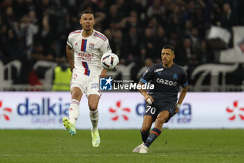2023-04-23 - Dejan LOVREN of Lyon and Alexis SANCHEZ of Marseille during the French championship Ligue 1 football match between Olympique Lyonnais (Lyon) and Olympique de Marseille on April 23, 2023 at Groupama stadium in Decines-Charpieu near Lyon, France - FOOTBALL - FRENCH CHAMP - LYON V MARSEILLE - FRENCH LIGUE 1 - SOCCER