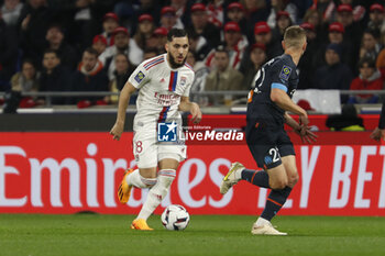 2023-04-23 - Rayan CHERKI of Lyon and Valentin RONGIER of Marseille during the French championship Ligue 1 football match between Olympique Lyonnais (Lyon) and Olympique de Marseille on April 23, 2023 at Groupama stadium in Decines-Charpieu near Lyon, France - FOOTBALL - FRENCH CHAMP - LYON V MARSEILLE - FRENCH LIGUE 1 - SOCCER