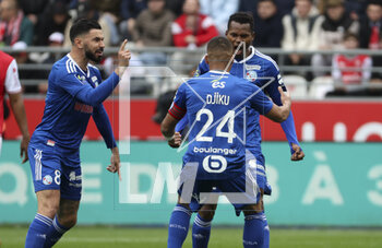 2023-04-23 - Habib Diallo of Strasbourg celebrates his first goal with Morgan Sanson (left), Alexander Djiku during the French championship Ligue 1 football match between Stade de Reims and RC Strasbourg on April 23, 2023 at Stade Auguste Delaune in Reims, France - FOOTBALL - FRENCH CHAMP - REIMS V STRASBOURG - FRENCH LIGUE 1 - SOCCER