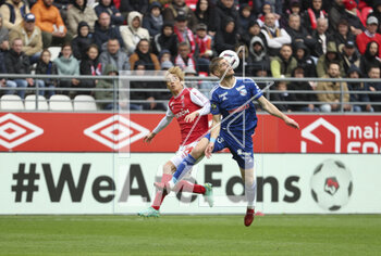2023-04-23 - Junya Ito of Reims, Maxime Le Marchand of Strasbourg during the French championship Ligue 1 football match between Stade de Reims and RC Strasbourg on April 23, 2023 at Stade Auguste Delaune in Reims, France - FOOTBALL - FRENCH CHAMP - REIMS V STRASBOURG - FRENCH LIGUE 1 - SOCCER