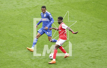 2023-04-23 - Azor Matusiwa of Reims, left Habib Diallo of Strasbourg during the French championship Ligue 1 football match between Stade de Reims and RC Strasbourg on April 23, 2023 at Stade Auguste Delaune in Reims, France - FOOTBALL - FRENCH CHAMP - REIMS V STRASBOURG - FRENCH LIGUE 1 - SOCCER