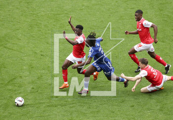 2023-04-23 - Azor Matusiwa of Reims, Ismael Doukoure of Strasbourg, Marshall Munetsi, Thomas Foket of Reims during the French championship Ligue 1 football match between Stade de Reims and RC Strasbourg on April 23, 2023 at Stade Auguste Delaune in Reims, France - FOOTBALL - FRENCH CHAMP - REIMS V STRASBOURG - FRENCH LIGUE 1 - SOCCER