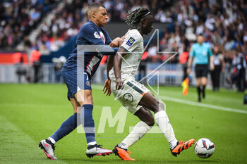 2023-04-30 - Kylian MBAPPE of PSG and Bamo MEITE of Lorient during the French championship Ligue 1 football match between Paris Saint-Germain and FC Lorient on April 30, 2023 at Parc des Princes stadium in Paris, France - FOOTBALL - FRENCH CHAMP - PARIS SG V LORIENT - FRENCH LIGUE 1 - SOCCER