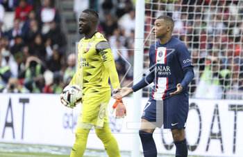 2023-04-30 - Goalkeeper of Lorient Yvon Mvogo, Kylian Mbappe of PSG during the French championship Ligue 1 football match between Paris Saint-Germain and FC Lorient on April 30, 2023 at Parc des Princes stadium in Paris, France - FOOTBALL - FRENCH CHAMP - PARIS SG V LORIENT - FRENCH LIGUE 1 - SOCCER