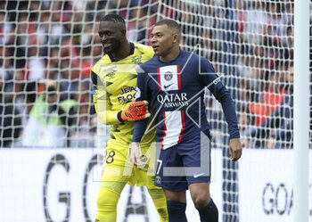 2023-04-30 - Goalkeeper of Lorient Yvon Mvogo, Kylian Mbappe of PSG during the French championship Ligue 1 football match between Paris Saint-Germain and FC Lorient on April 30, 2023 at Parc des Princes stadium in Paris, France - FOOTBALL - FRENCH CHAMP - PARIS SG V LORIENT - FRENCH LIGUE 1 - SOCCER
