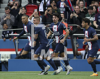 2023-04-30 - Kylian Mbappe of PSG celebrates his goal with Marco Verratti, Vitinha, Juan Bernat of PSG during the French championship Ligue 1 football match between Paris Saint-Germain and FC Lorient on April 30, 2023 at Parc des Princes stadium in Paris, France - FOOTBALL - FRENCH CHAMP - PARIS SG V LORIENT - FRENCH LIGUE 1 - SOCCER