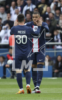 2023-04-30 - Kylian Mbappe of PSG celebrates his goal with Lionel Messi (left) during the French championship Ligue 1 football match between Paris Saint-Germain and FC Lorient on April 30, 2023 at Parc des Princes stadium in Paris, France - FOOTBALL - FRENCH CHAMP - PARIS SG V LORIENT - FRENCH LIGUE 1 - SOCCER