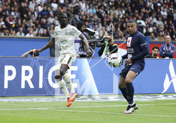 2023-04-30 - Bamo Meite of Lorient, Kylian Mbappe of PSG during the French championship Ligue 1 football match between Paris Saint-Germain and FC Lorient on April 30, 2023 at Parc des Princes stadium in Paris, France - FOOTBALL - FRENCH CHAMP - PARIS SG V LORIENT - FRENCH LIGUE 1 - SOCCER
