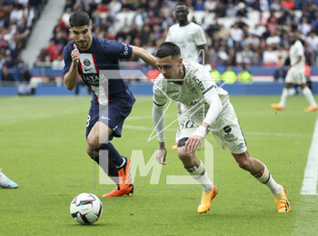 2023-04-30 - Carlos Soler of PSG, Enzo Le Fee of Lorient during the French championship Ligue 1 football match between Paris Saint-Germain and FC Lorient on April 30, 2023 at Parc des Princes stadium in Paris, France - FOOTBALL - FRENCH CHAMP - PARIS SG V LORIENT - FRENCH LIGUE 1 - SOCCER