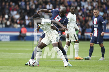 2023-04-30 - Bamba Dieng of Lorient, Danilo Pereira of PSG during the French championship Ligue 1 football match between Paris Saint-Germain and FC Lorient on April 30, 2023 at Parc des Princes stadium in Paris, France - FOOTBALL - FRENCH CHAMP - PARIS SG V LORIENT - FRENCH LIGUE 1 - SOCCER