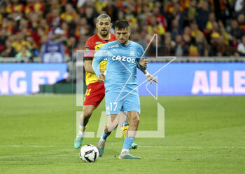 2023-05-06 - Cengiz Under of Marseille, Facundo Medina of Lens during the French championship Ligue 1 football match between RC Lens (RCL) and Olympique de Marseille (OM) on May 6, 2023 at Stade Bollaert-Delelis in Lens, France - FOOTBALL - FRENCH CHAMP - LENS V MARSEILLE - FRENCH LIGUE 1 - SOCCER