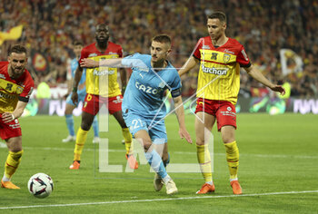 2023-05-06 - Valentin Rongier of Marseille, Przemyslaw Frankowski of Lens during the French championship Ligue 1 football match between RC Lens (RCL) and Olympique de Marseille (OM) on May 6, 2023 at Stade Bollaert-Delelis in Lens, France - FOOTBALL - FRENCH CHAMP - LENS V MARSEILLE - FRENCH LIGUE 1 - SOCCER