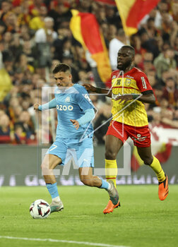 2023-05-06 - Cengiz Under of Marseille, Jean Onana of Lens during the French championship Ligue 1 football match between RC Lens (RCL) and Olympique de Marseille (OM) on May 6, 2023 at Stade Bollaert-Delelis in Lens, France - FOOTBALL - FRENCH CHAMP - LENS V MARSEILLE - FRENCH LIGUE 1 - SOCCER