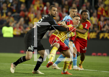 2023-05-06 - Marseille goalkeeper Pau Lopez, Przemyslaw Frankowski of Lens during the French championship Ligue 1 football match between RC Lens (RCL) and Olympique de Marseille (OM) on May 6, 2023 at Stade Bollaert-Delelis in Lens, France - FOOTBALL - FRENCH CHAMP - LENS V MARSEILLE - FRENCH LIGUE 1 - SOCCER