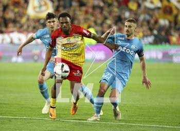 2023-05-06 - Lois Openda of Lens, Valentin Rongier of Marseille during the French championship Ligue 1 football match between RC Lens (RCL) and Olympique de Marseille (OM) on May 6, 2023 at Stade Bollaert-Delelis in Lens, France - FOOTBALL - FRENCH CHAMP - LENS V MARSEILLE - FRENCH LIGUE 1 - SOCCER