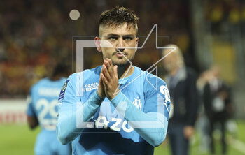 2023-05-06 - Cengiz Under of Marseille salutes the supporters following the French championship Ligue 1 football match between RC Lens (RCL) and Olympique de Marseille (OM) on May 6, 2023 at Stade Bollaert-Delelis in Lens, France - FOOTBALL - FRENCH CHAMP - LENS V MARSEILLE - FRENCH LIGUE 1 - SOCCER