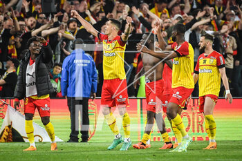 2023-05-06 - Florian SOTOCA of Lens celebrate the victory with teammates during the French championship Ligue 1 football match between RC Lens and Olympique de Marseille on May 6, 2023 at Bollaert-Delelis stadium in Lens, France - FOOTBALL - FRENCH CHAMP - LENS V MARSEILLE - FRENCH LIGUE 1 - SOCCER