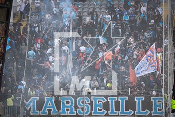 2023-05-06 - Supporters of Marseille during the French championship Ligue 1 football match between RC Lens and Olympique de Marseille on May 6, 2023 at Bollaert-Delelis stadium in Lens, France - FOOTBALL - FRENCH CHAMP - LENS V MARSEILLE - FRENCH LIGUE 1 - SOCCER