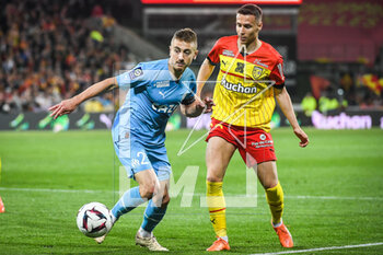 2023-05-06 - Valentin RONGIER of Marseille and Przemyslaw Adam FRANKOWSKI of Lens during the French championship Ligue 1 football match between RC Lens and Olympique de Marseille on May 6, 2023 at Bollaert-Delelis stadium in Lens, France - FOOTBALL - FRENCH CHAMP - LENS V MARSEILLE - FRENCH LIGUE 1 - SOCCER