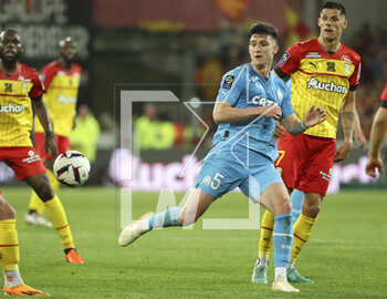 2023-05-06 - Leonardo Balerdi of Marseille, Florian Sotoca of Lens during the French championship Ligue 1 football match between RC Lens (RCL) and Olympique de Marseille (OM) on May 6, 2023 at Stade Bollaert-Delelis in Lens, France - FOOTBALL - FRENCH CHAMP - LENS V MARSEILLE - FRENCH LIGUE 1 - SOCCER