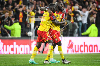 2023-05-06 - Massadio HAIDARA of Lens celebrate the victory with Seko FOFANA of Lens during the French championship Ligue 1 football match between RC Lens and Olympique de Marseille on May 6, 2023 at Bollaert-Delelis stadium in Lens, France - FOOTBALL - FRENCH CHAMP - LENS V MARSEILLE - FRENCH LIGUE 1 - SOCCER